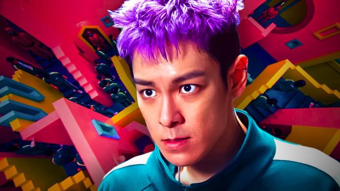 A close-up of a person with purple hair, wearing a teal shirt, set against a vibrant, colorful background featuring abstract shapes and figures.