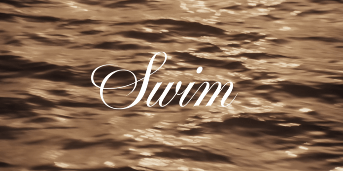 The word 'Swim' elegantly displayed over a background of shimmering water.