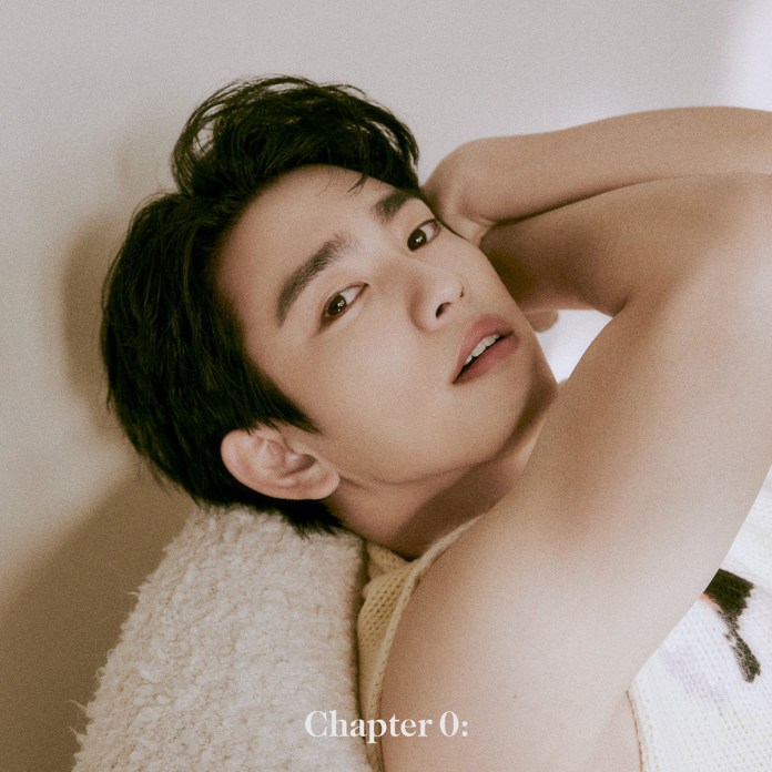 Park Jinyoung with styled dark hair rests on a plush surface, looking directly at the camera with a relaxed expression. He is wearing a light-colored sleeveless top, and the background is neutral. The text 'Chapter 0:' is visible at the bottom of the image.
