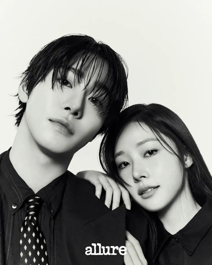 Ahn Hyo Seop with long hair and a woman with long hair, both wearing formal attire, posing closely together with a soft expression.