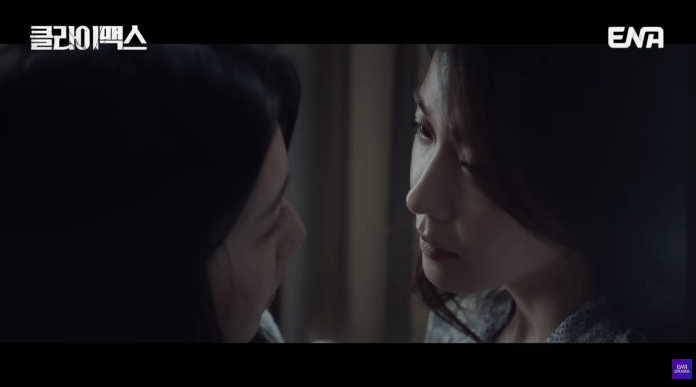 Ha Ji-won and  Han Dong-hee share a close, intimate moment, gazing at each other with emotional expressions in a softly lit room.