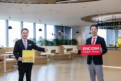 (From the left) Mr. Joseph Leung, Chief Operating Officer (Hong Kong & Macau) and Executive Director of Savills, and Mr. Ricky Chong, Managing Director of Ricoh Hong Kong, announcing a collaboration to advance AI- and drone-enabled building inspection solutions.