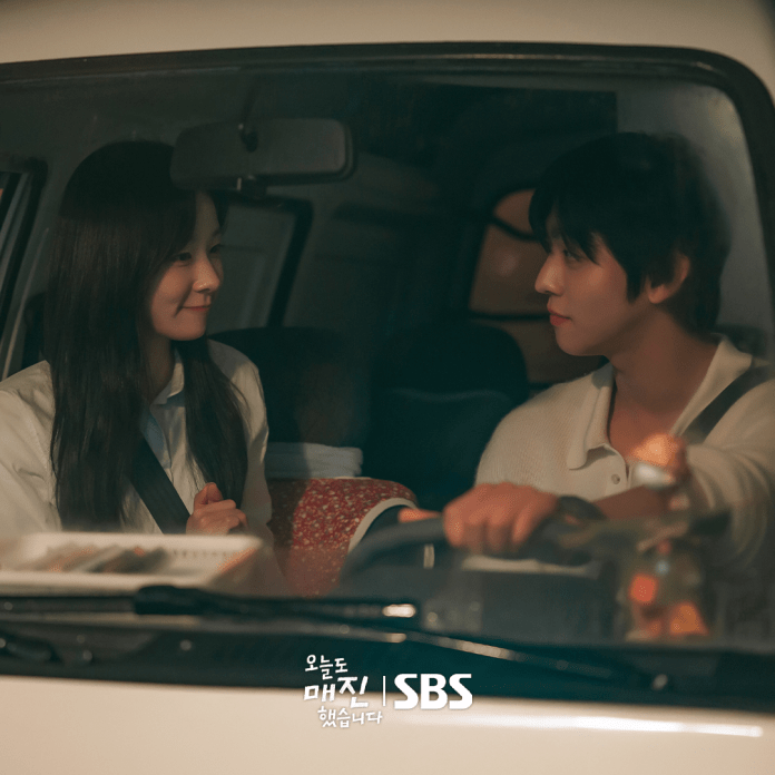 Ahn Hyo Seop sitting in a car, smiling and gazing at each other, creating a warm and intimate atmosphere.