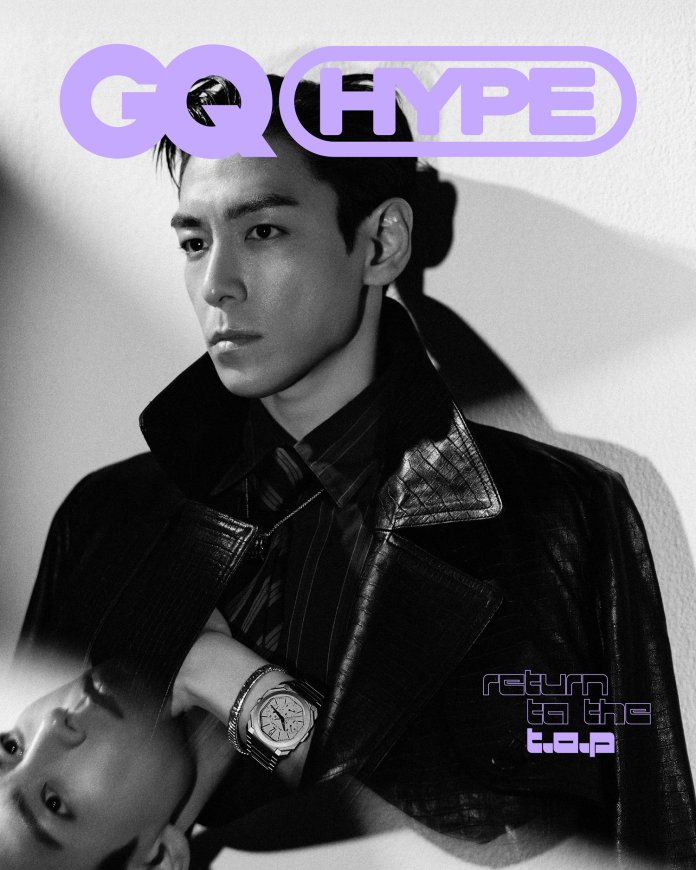 T.O.P wearing a leather jacket, gazing thoughtfully to the side. The image features bold purple text overlay that reads 'GQ HYPE' and 'return to the t.o.p'.