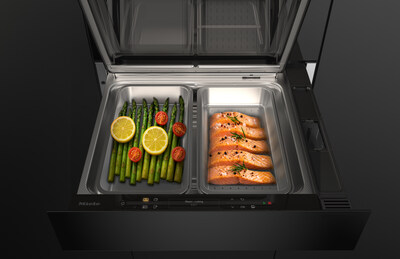 The new Miele steam drawer, when combined with a 45 cm compact oven with microwave in a 60 cm niche, forms a space-saving 3-in-1 solution for baking, reheating and steam cooking, with two separate steam cooking containers for preparing different food at the same time. Coming March 2027. (Photo: Miele) The new Miele steam drawer, when combined with a 45 cm compact oven with microwave in a 60 cm niche, forms a space-saving 3-in-1 solution for baking, reheating and steam cooking, with two separate steam cooking containers for preparing different food at the same time. Coming March 2027. (Photo: Miele)