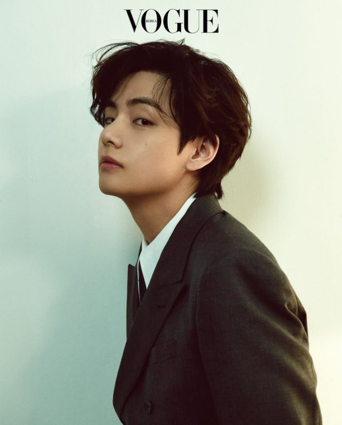 V in a suit, with tousled hair, against a light background. The text 'VOGUE KOREA' is displayed at the top.