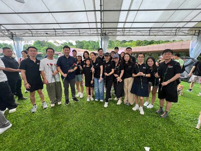 Mr Chee Hong Tat, Minister for National Development, together with Mr John Ge, CEO of BIT, and BIT colleagues at Pawpathon 2026.