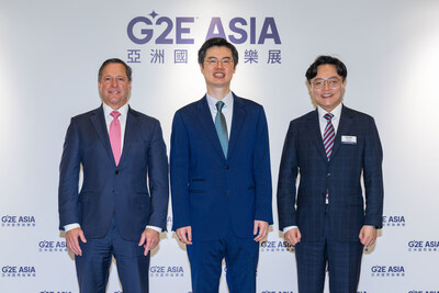 Following his keynote address at G2E Asia 2026, Chum (centre) gathers with Bill Miller (left), president and CEO of the American Gaming Association, and J.B. Son (right), senior vice president of Reed Exhibitions, Asia Pacific. (PRNewsfoto/Sands China Ltd.)