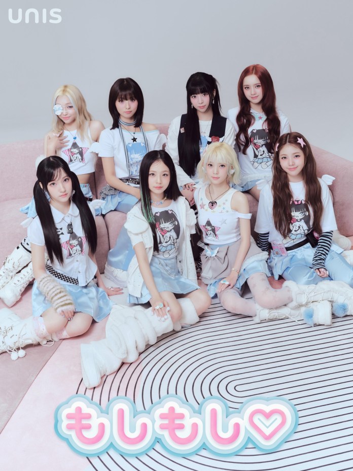 UNIS dressed in fashionable outfits, sitting together on a pink couch. They have varying hairstyles and accessories, creating a cute and playful aesthetic. The background features a spiral patterned rug, and the text 'もしもし♡' is displayed in a whimsical style.