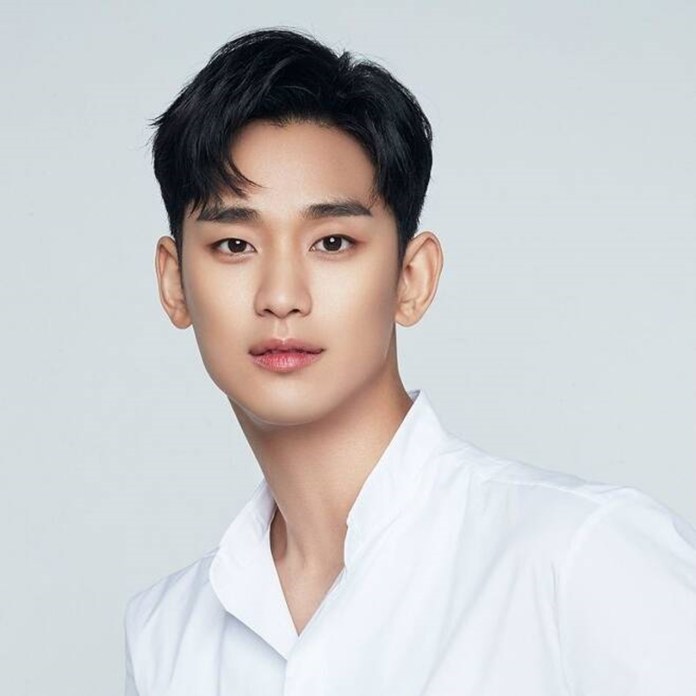 Kim Soo-hyun with short black hair, wearing a white shirt, against a plain light background.