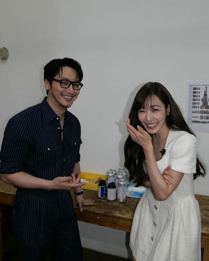 Tiffany Young and Byun Yo-han laughing and playfully.