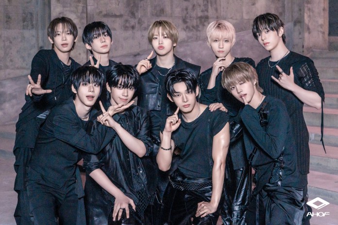 AHOF posing together in stylish black outfits with various poses and expressions.