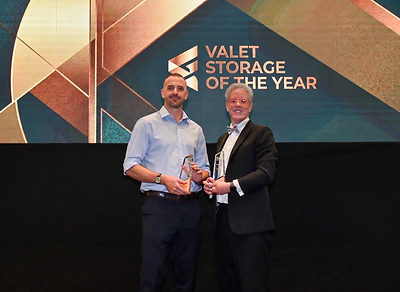 Spacebox Founder Lewis Cerne (left) accepts the "Valet Storage of the Year" award from Self Storage Association Asia (SSAA) Executive Director Andrew Work (right).
