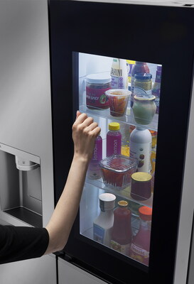 The LG InstaView™ refrigerator allows users to check its contents without opening the door by simply knocking twice on the glass panel. (PRNewsfoto/LG Electronics)