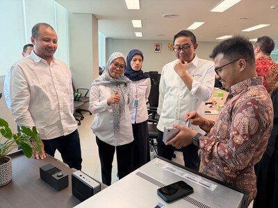 Distinguished guests interacted with the products on display (PRNewsfoto/Home Control International Limited)