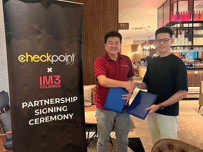 Benjamin Yeow (left), Chief Executive Officer of CheckPointSpot Pte. Ltd., and Phyo Myint Han (right), Managing Director of IM3 Holdings Co., Ltd., exchange partnership agreements following the signing of an exclusive strategic partnership to introduce CheckPointSpot's integrated race technology ecosystem to Myanmar. Benjamin Yeow (left), Chief Executive Officer of CheckPointSpot Pte. Ltd., and Phyo Myint Han (right), Managing Director of IM3 Holdings Co., Ltd., exchange partnership agreements following the signing of an exclusive strategic partnership to introduce CheckPointSpot's integrated race technology ecosystem to Myanmar.
