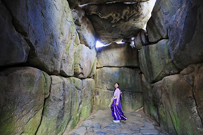 The Ishibutai Tumulus features a stone chamber built with over 30 massive stones. Visitors can go inside this unique structure.