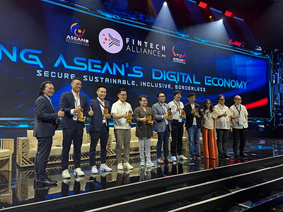 Key participants and VIPs posing for a group photo under the theme 'Building ASEAN's Digital Economy' at the ASEAN Tech Summit 2026