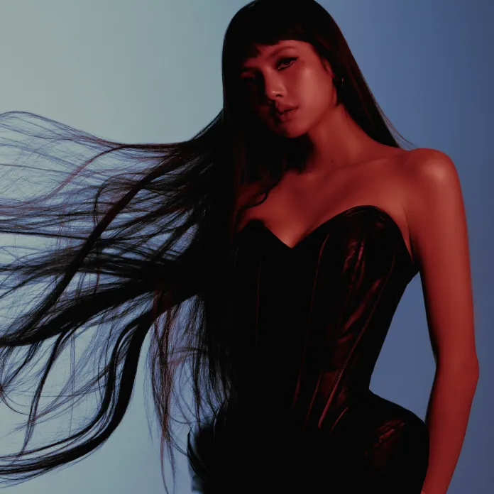 Lisa with long, flowing hair wearing a black corset against a gradient background.