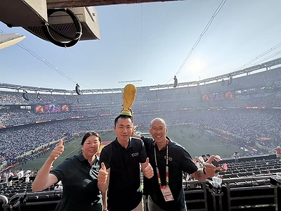 Selina Zhou (L) and the CSTS team achieved the highest hospitality sales in World Cup history for Greater China, photographed at the FIFA World Cup 2026 final match on July 19, 2026, at the New York New Jersey Stadium