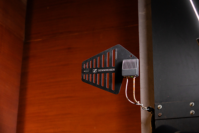 The 2 DAD antennas are placed at the upper-right and upper-left corners of the stage.