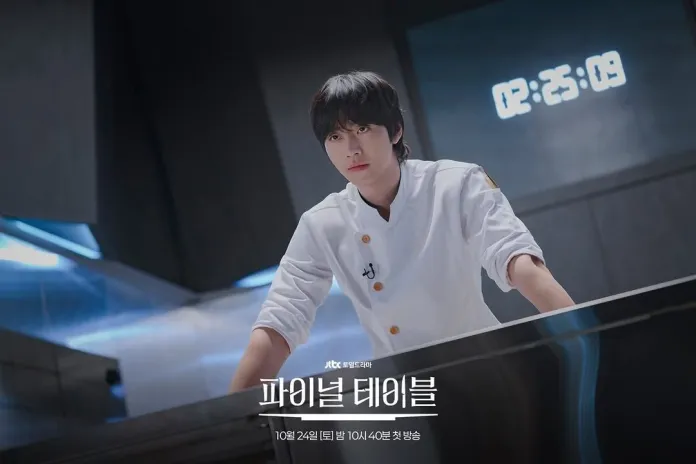 Ahn Hyo-seop in a white uniform leaning over a kitchen counter, focused and serious, with a digital clock displaying 02:25:09 in the background.