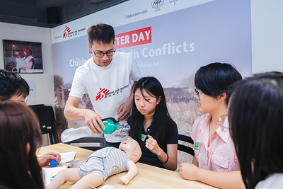 Obstetrician-gynaecologist Dr. Rayman Wong demonstrates how to help a newborn breathe using a bag-valve mask.