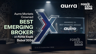 Aurra Markets crowned Best Emerging Broker at Forex Expo Dubai 2026, featuring the award trophy alongside Aurra Markets and Forex Expo Dubai branding. The event took place on 22–23 September 2026