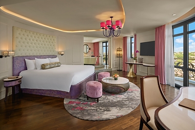 An art-inspired guest room at Hotel Royal Hoi An – The Legacy By The River, reflecting the hotel’s timeless yet contemporary design.
