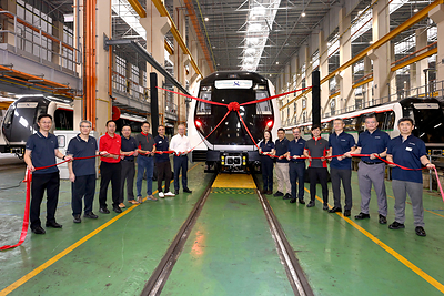 Representatives from the Land Transport Authority (LTA) Singapore, SMRT Trains and Alstom at the final train handover ceremony.