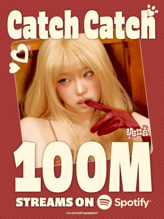 A promotional image featuring YENA with long blonde hair and red gloves, playfully biting their finger. The text reads 'Catch Catch' and '100M STREAMS ON Spotify'.