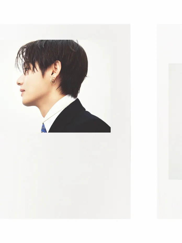 BTS's V with dark hair and an earring, wearing a suit and tie against a neutral background.