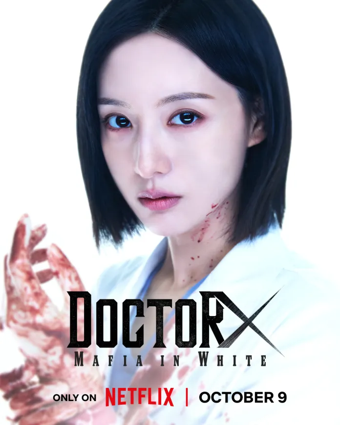 Portrait of Kim Ji-won with short dark hair, wearing a white shirt, looking intently with blood on her hand and a cut on her neck, promoting 'Doctor X: Mafia in White' on Netflix, releasing October 9.