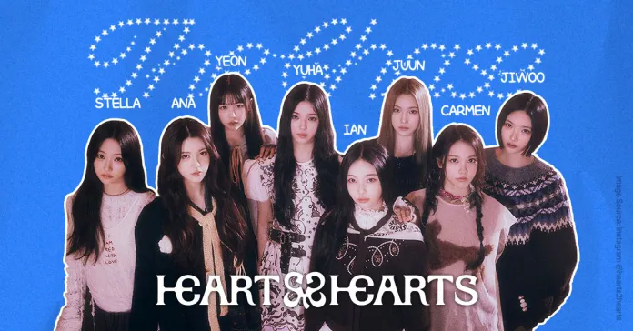 Group photo of the eight members of Hearts2Hearts on a blue background with their names written above them