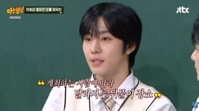 Ahn Hyo-seop with black hair wearing a school uniform speaks in front of a green chalkboard, with text in Korean overlaying the image.