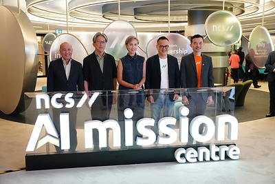 (From left) Singtel Group CEO Yuen Kuan Moon, NCS Chairman Lim Swee Say, Minister for Digital Development and Information Mrs. Josephine Teo, NCS CEO Sam Liew, and NCS Chief AI Officer Edward Chen at the launch of the NCS AI Mission Centre on 29 October 2026.