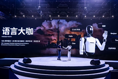 Xiong Yan, Partner, Executive Director, Co-President, President of Central R&D, and President of the Interaction Business at AGIBOT, presents WITA-Omni and its planned deployment roadmap for more natural, multimodal human–robot interaction.