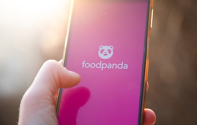 User opening up the foodpanda app on a mobile phone