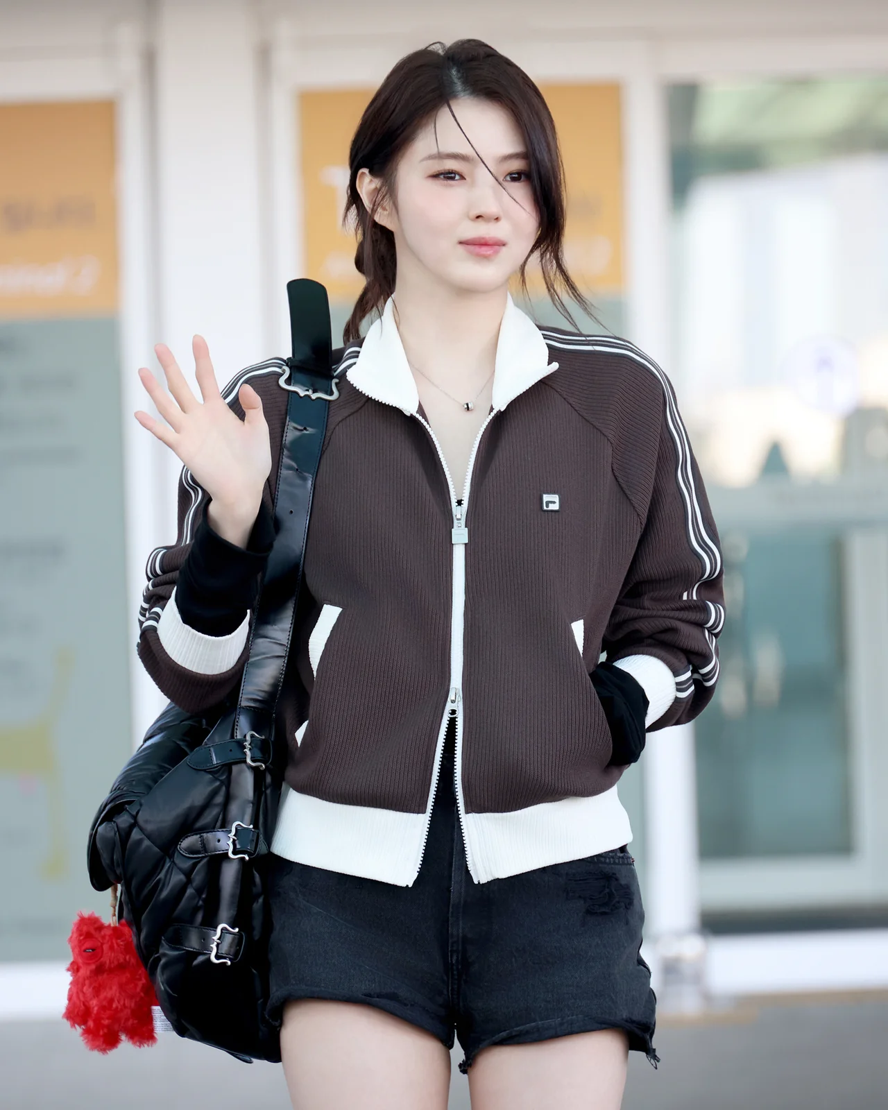 /사진=휠라, 한소희 '밀라노행' 스포티 공항패션 완성