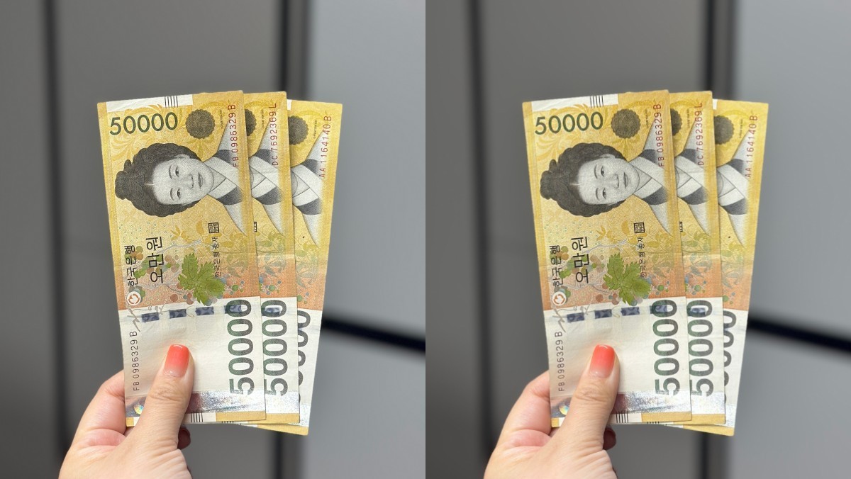 한국 지폐를 들고 있는 모습. / SE0-shutterstock