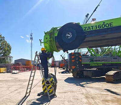 A Zoomlion service engineer performs RDW-related compliance and maintenance work on a ZAT1600E all-terrain crane in the Netherlands A Zoomlion service engineer performs RDW-related compliance and maintenance work on a ZAT1600E all-terrain crane in the Netherlands