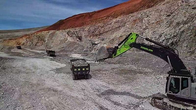 Zoomlion mining excavators and mining dump trucks operate at an open-pit mine in Inner Mongolia, China Zoomlion mining excavators and mining dump trucks operate at an open-pit mine in Inner Mongolia, China